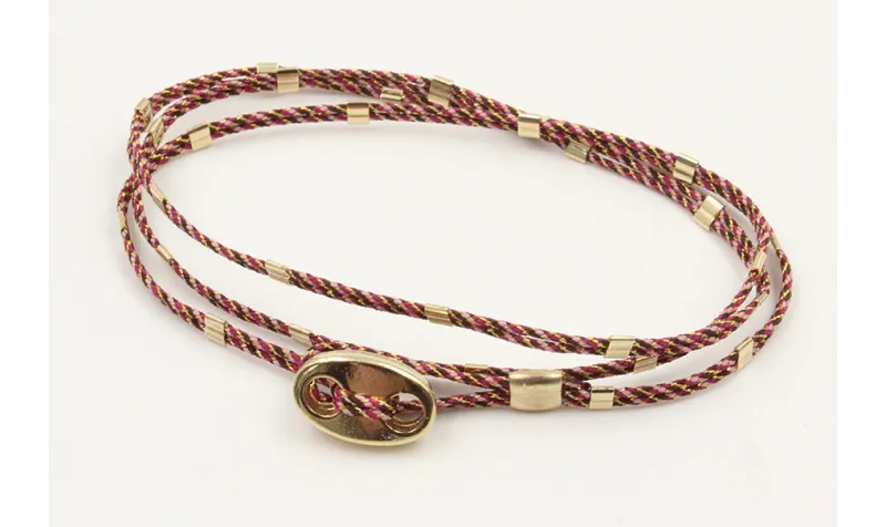 Pulseras micro driza colores morado,lila y oro con