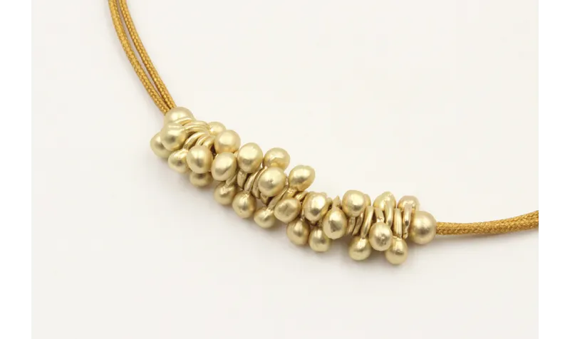 Pulsera hilo macra,e marrón claro con nudo macrame