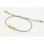 Pulsera macrame azul,gris y oro con nudo macrame p