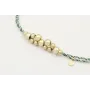 Pulsera macrame azul,gris y oro con nudo macrame p