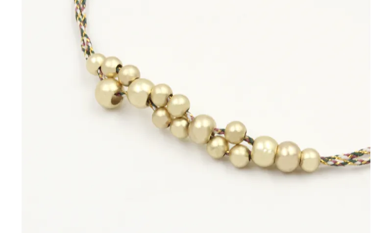 Pulsera macrame marrón, rosa y oro con nudo macram