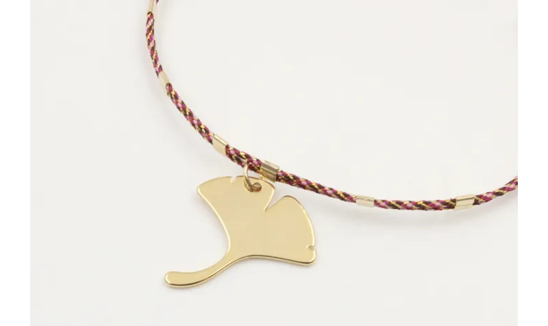 Pulsera hilo microdriza granate y oro con nudo mac