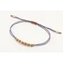 Pulsera macrame morado con nudo color oro rosa y r