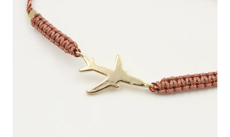 Pulsera hilo granate,oro y microdrusa oro rosa nud