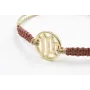 Pulsera hilo macrame oro palido con nudo oro rosa 