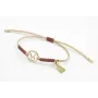Pulsera hilo macrame oro palido con nudo oro rosa 