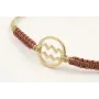 Pulsera hilo macrame oro palido con nudo oro rosa 