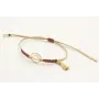 Pulsera hilo macrame oro palido con nudo oro rosa 