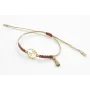 Pulsera hilo macrame oro palido con nudo oro rosa 