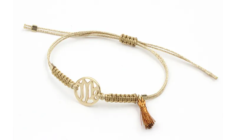 Pulsera hilo macrame oro palido con nudo dorado di