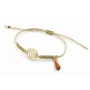 Pulsera hilo macrame oro palido con nudo dorado di