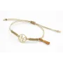 Pulsera hilo macrame oro palido con nudo dorado di