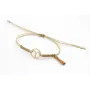 Pulsera hilo macrame oro palido con nudo dorado di