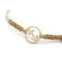Pulsera hilo macrame oro palido con nudo dorado di