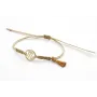 Pulsera hilo macrame oro palido con nudo dorado di