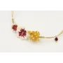 Pulsera nudo serpiente oro pálido con flores esmal