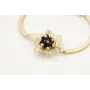 Pulsera semi rigida en oro mate con centro hoja de