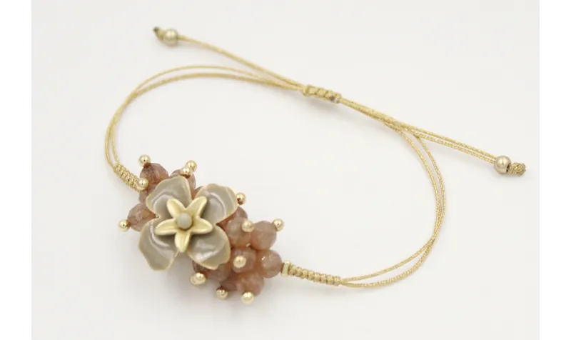 Pulsera nudo serpiente oro palido con burruño face