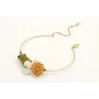 Pulsera rigida con mariposa crema, flor esmalte ma