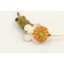 Pulsera rigida con mariposa crema, flor esmalte ma