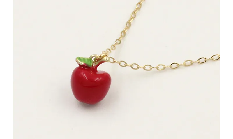 Solitario cadena eslabón dorado con manzana esmalt