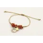 Pulsera hilo dorado palido con colgante disco dora
