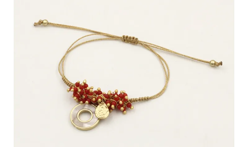 Pulsera hilo dorado palido con colgante disco dora