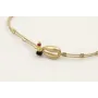 Pulsera hilo dorado palido con tubitos aplastados 