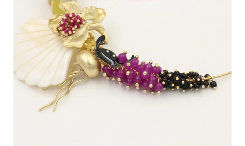 Collar rigido burruños abalorio negro y morado con