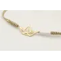 Pulsera hilo dorado palido con nudo serpiente y ba