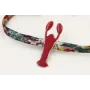 Pulsera lazo liberty azulon con flores rojas,mosta