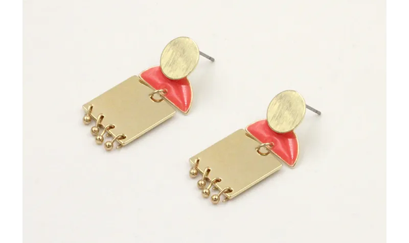 Pendientes perno disco dorado con semocirculo esma