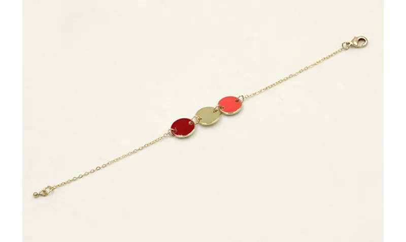 Pulsera cadena eslabón pequeño dorado con circulos