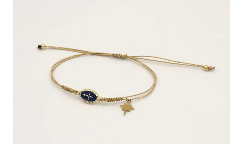 Pulsera hilo dorado palido con entrepieza cruz esm