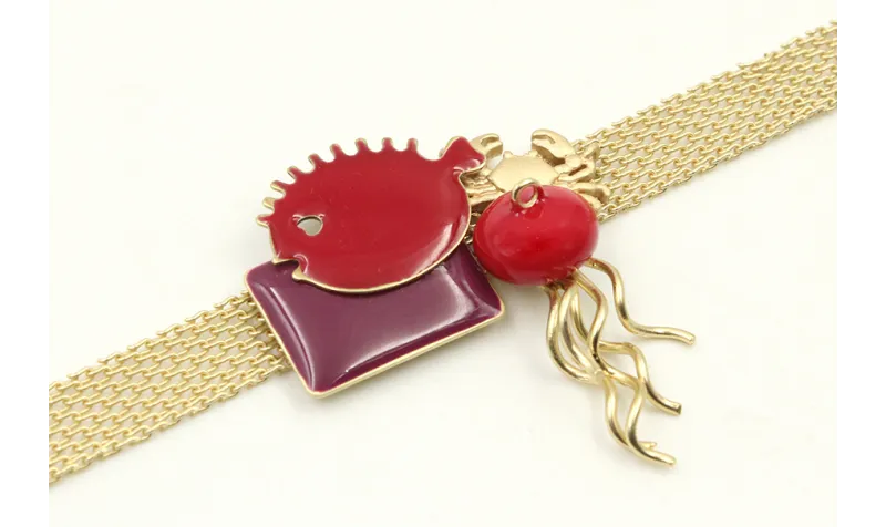 Pulsera cadena plana dorado mate con medusa y pez 