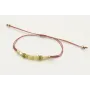 Pulsera hilo macramé oro rosa con rueda estreiada,