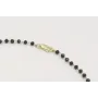 Collar cadena facetada negra con flor 7 pétalos do