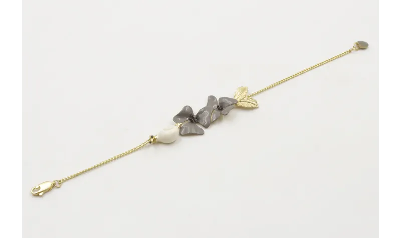 Pulsera eslabón plano dorado mate con caracol esma