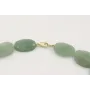 Collar piedras verdes con centro de flores y hojas