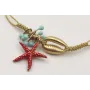 Pulsera hilo fino dorado con nudo serpiente, conch