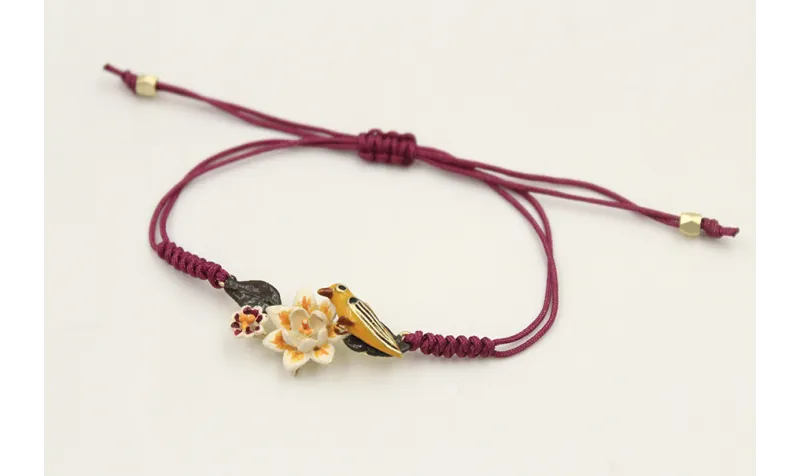 Pulsera hilo granate con nudo serpiente centro ado