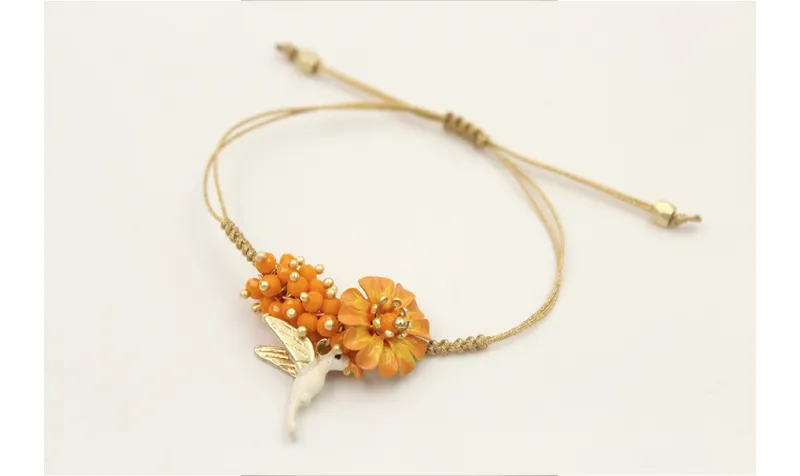 Pulsera hilo fino dorado con nudo serpiente, burru