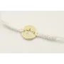 Pulsera hilo color crema con nudo serpiente y chap