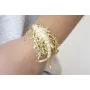 Brazalete coral dorado mate con pez esmlatado crem