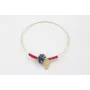 Pulsera rigida dorada brillo con nudo macramé rojo