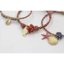 Pulsera de driza rojiza y rosa con concha, estrell