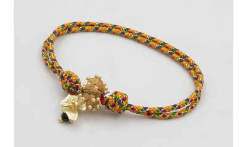 Pulsera nudo corredizo de driza naranja y verde co
