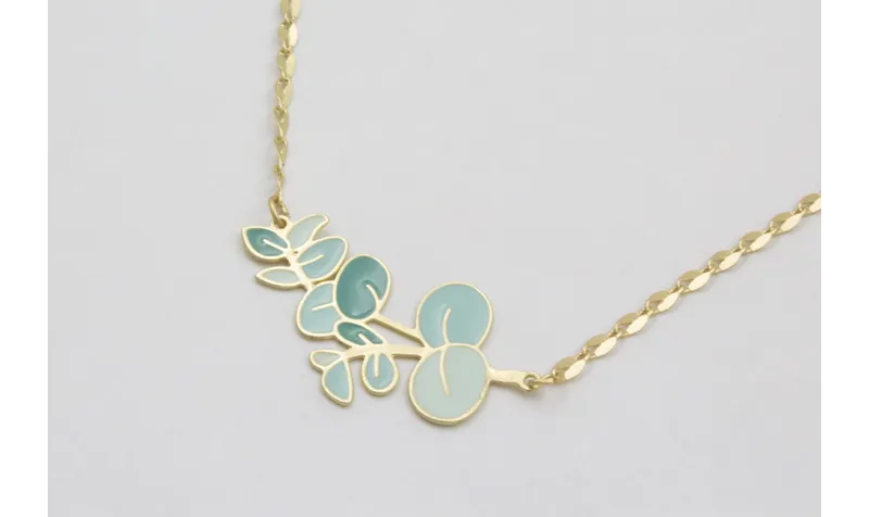 Collar cadena eslavón ovalado dorado mate con colg