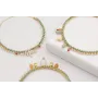 Pulsera rigida dorada con cadena de strass turques