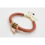 Pulsera de seda rellena color cobrizo con aritos d